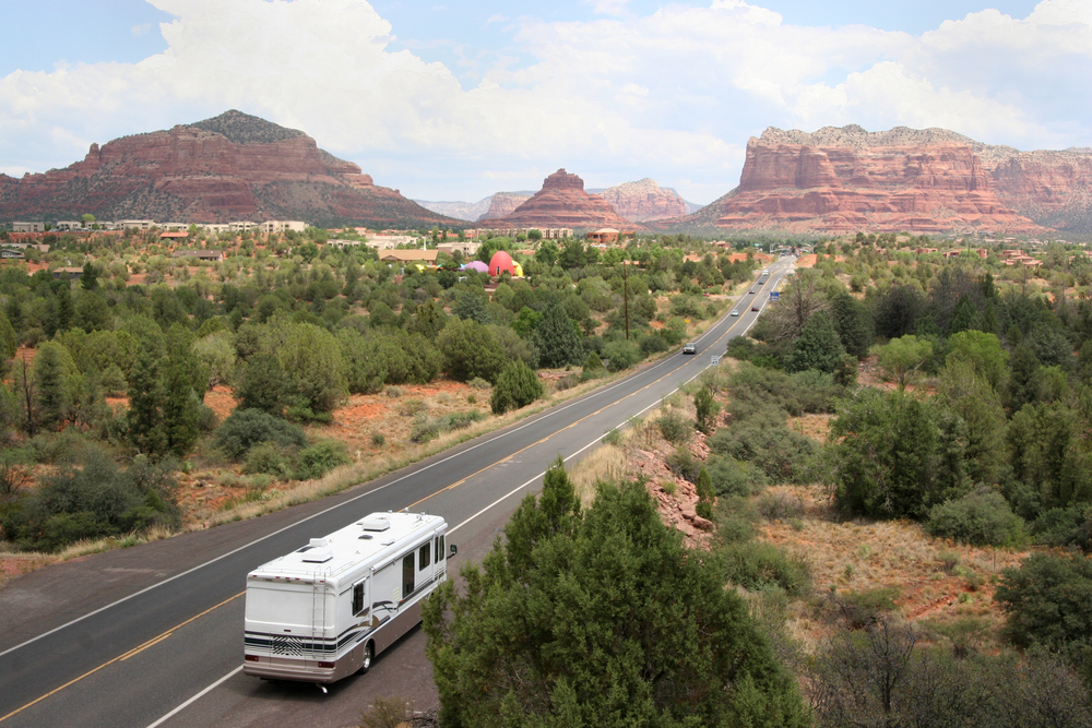 aerial view of an RV driving on the highway