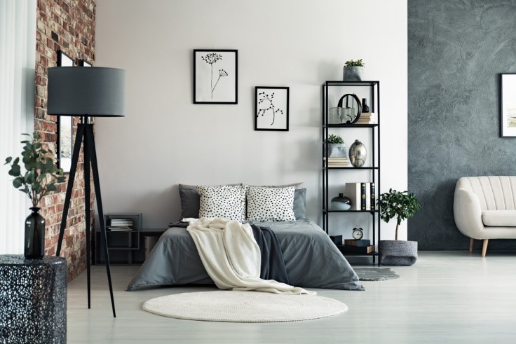 bed in grey room with grey decor