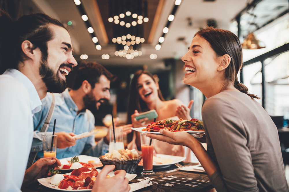 Friends eating breakfast at a restaurant