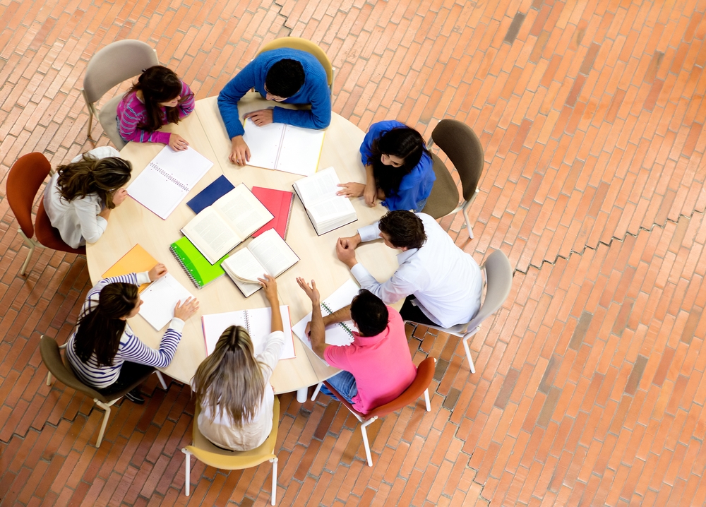 study group at a round table all focused